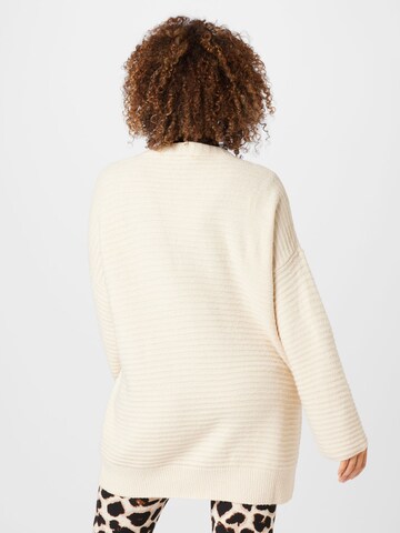 ABOUT YOU Curvy Knit cardigan 'Theodora' in Beige