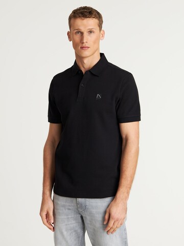 CHASIN' Poloshirt 'Archpolo' in Schwarz: Vorderseite