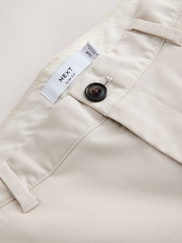 Coupe slim Pantalon chino Next en beige