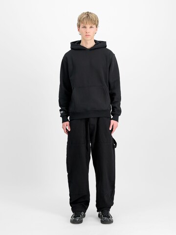 ALPHA INDUSTRIES Collegepaita 'Label' värissä musta