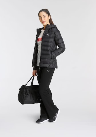 PUMA Sportjacke in Schwarz