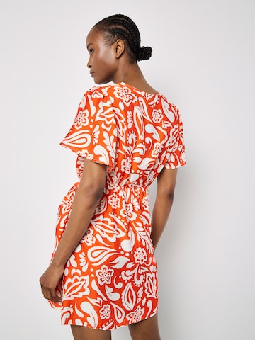 Robe ' ' Apricot en orange