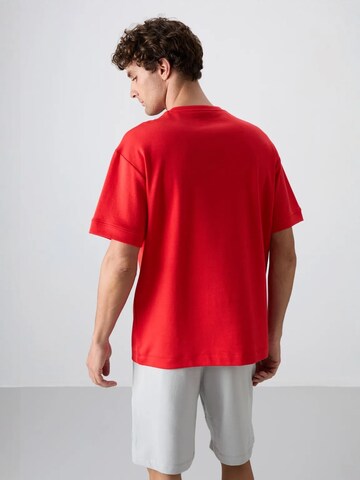 Maglietta di Tommy Life in rosso
