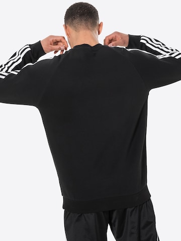 ADIDAS ORIGINALS Regular fit Sweatshirt 'Adicolor Classics 3-Stripes' in Black