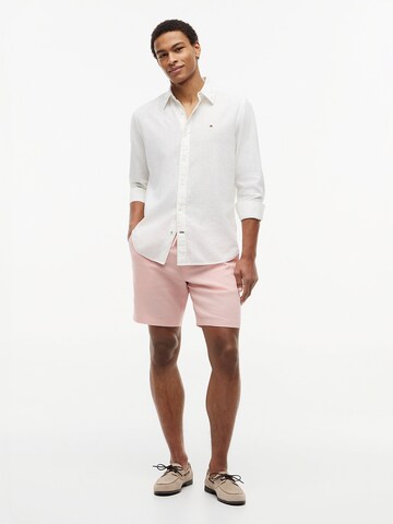 Loosefit Pantalon chino TOMMY HILFIGER en rose