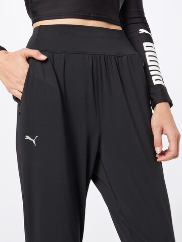 PUMA Tapered Sportbroek in Zwart