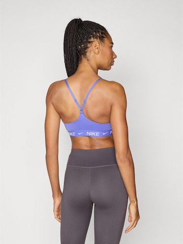 Bustier Soutien-gorge de sport 'INDY' NIKE en bleu