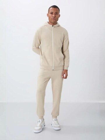Tommy Life Joggingpak in Beige