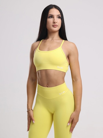neverover Korzetová Sportovní podprsenka 'Hue Cross-Back Strappy Bra' – žlutá
