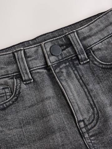 Next Skinny Jeans in Grau