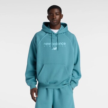 Veste de survêtement 'Trackside' new balance en bleu : devant