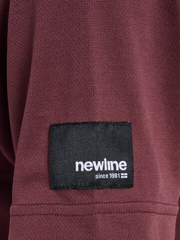 Newline Functioneel shirt 'CHARGE' in Bruin