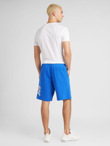 Nike Sportswear Loosefit Kalhoty 'CLUB' – modrá