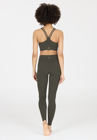 Athlecia Skinny Sportbroek 'Luxe' in Bruin
