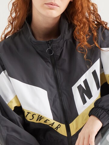 Nike Sportswear Övergångsjacka i grå