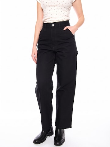 Carhartt WIP Baggy Hose‌‌‌‌‌‌‌ in Schwarz: Vorderseite