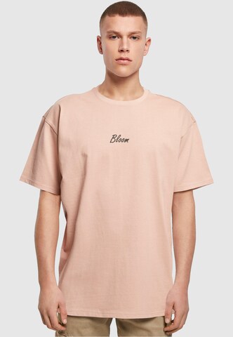 Merchcode T-Shirt 'Flowers Bloom' in Pink: predná strana