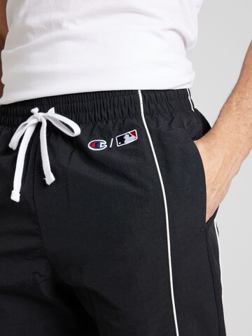 Tapered Pantaloni di Champion Authentic Athletic Apparel in nero