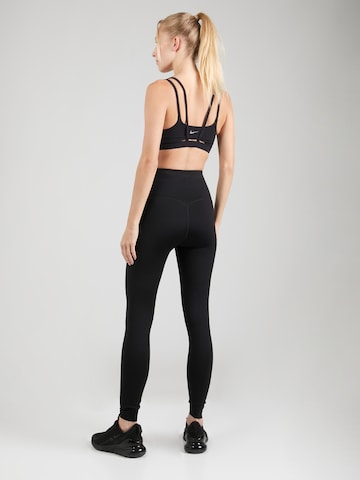 Skinny Pantalon de sport NIKE en noir