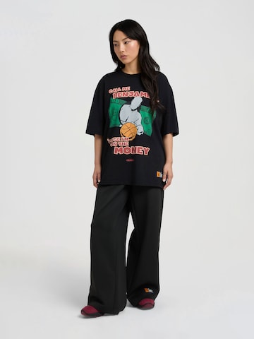 T-shirt 'Auf dem Geld' AND1 en noir