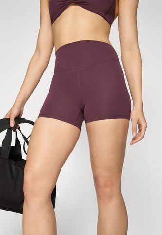 Fabletics Skinny Urheiluhousut värissä punainen