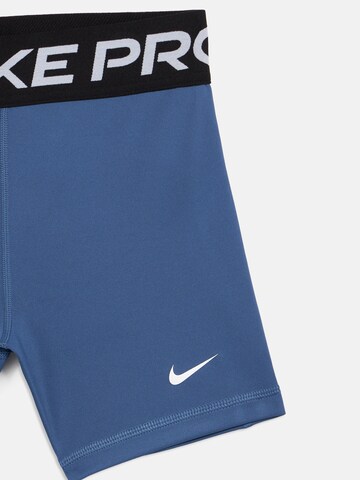 NIKE Skinny Sportbroek 'Pro' in Blauw