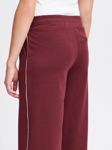 Wide leg Pantaloni ' Kate ' di ICHI in rosso