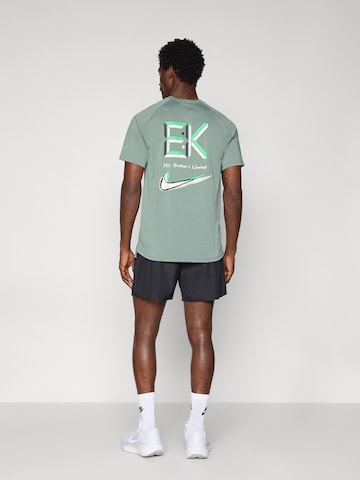 NIKE Szabványos Sportnadrágok 'WNTRZ CHLNGR' - fekete