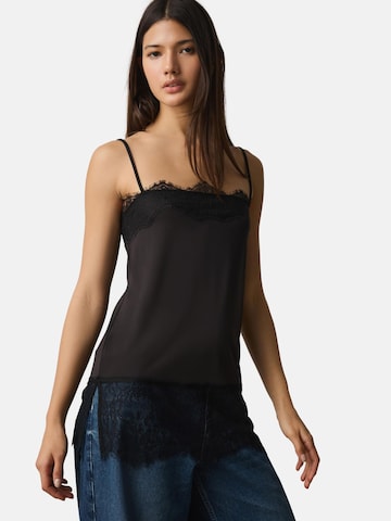 Next Top in Zwart: voorkant