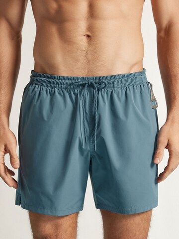 IUMAN Intimissimi Swim Trunks in Blue: front
