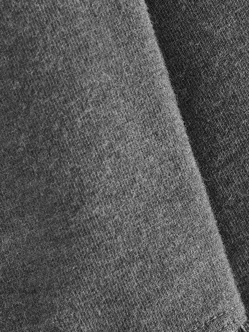 Skinny Leggings di Next in grigio