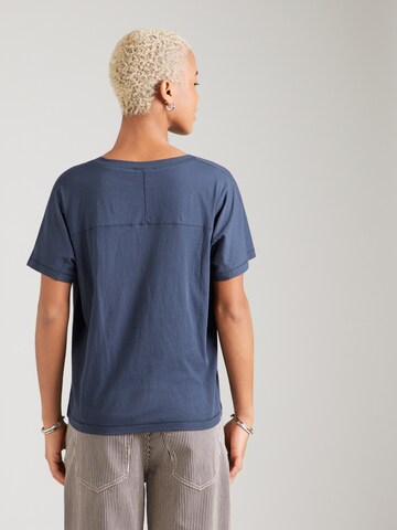 Tricou de la Marc O'Polo pe albastru: spate