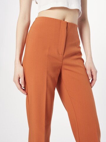 SOAKED IN LUXURY Flared Trousers with creases 'Corinne' in Brown