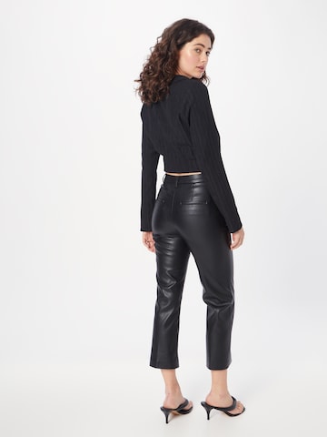 Regular Pantalon à plis Sisley en noir