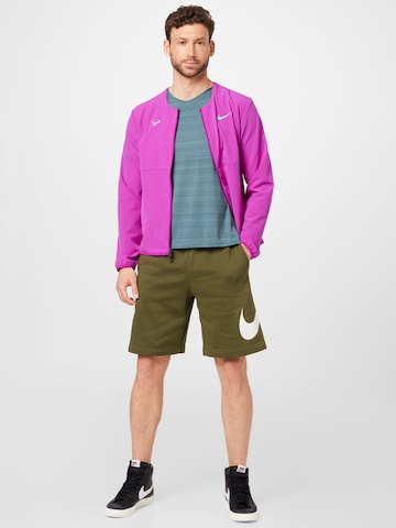 Nike Sportswear Regular Trousers 'Club' in Green