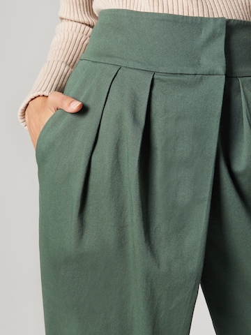 florence by mills exclusive for ABOUT YOU Loose fit Trousers 'Viola' in Green