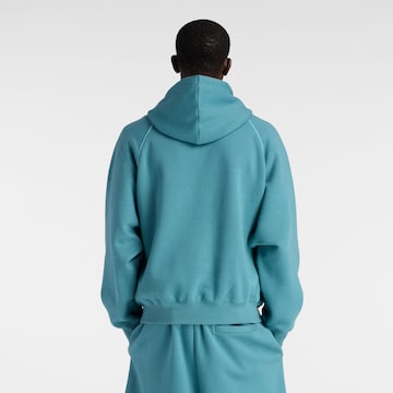 Veste de survêtement 'Trackside' new balance en bleu