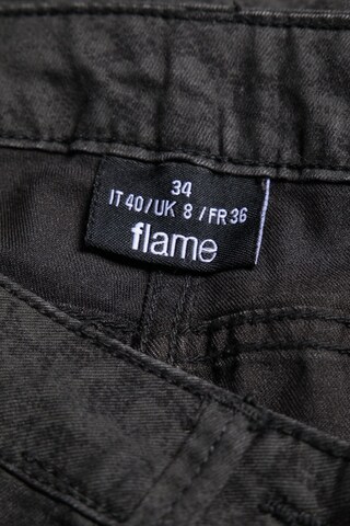 Flame Skinny-Jeans 25-26 in Schwarz