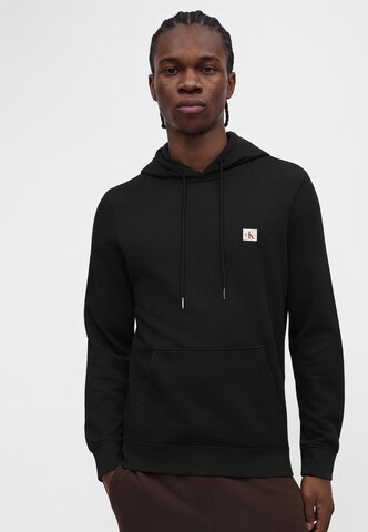 Bluză de molton de la Calvin Klein Jeans pe negru: față