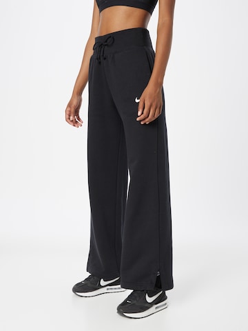 Wide leg Pantaloni 'Phoenix Fleece' de la NIKE pe negru: față