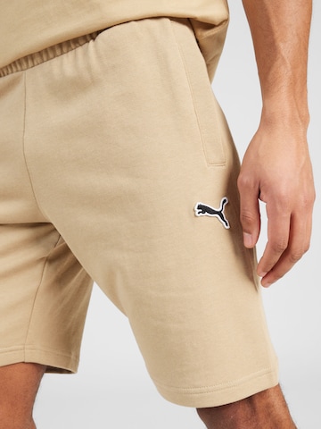 PUMA Regular Trousers 'BETTER ESSENTIALS  9' in Brown