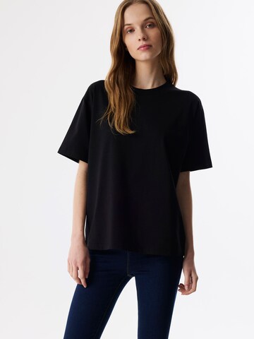 Twist Shirt in Zwart: voorkant