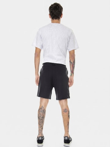 ADIDAS Luźne Spodnie 'ADV' w kolorze czarny