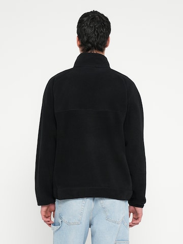 ELLESSE Urheiluneule 'Caponie' värissä musta