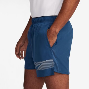 NIKE Regular Workout Pants 'CHALLENGER' in Blue