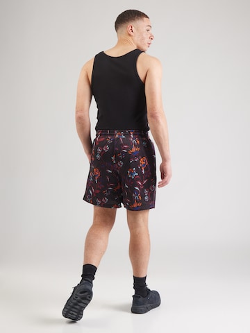 PUMA - Regular Calças 'FLORAL SPORT' em preto