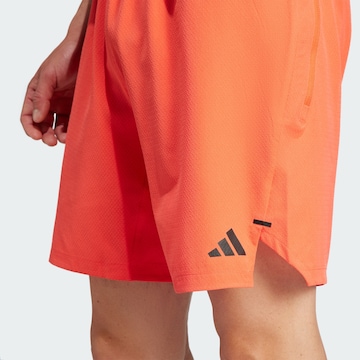 ADIDAS PERFORMANCE Regular Workout Pants in Orange