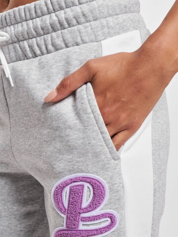 Slimfit Pantaloni 'Team' di PUMA in grigio