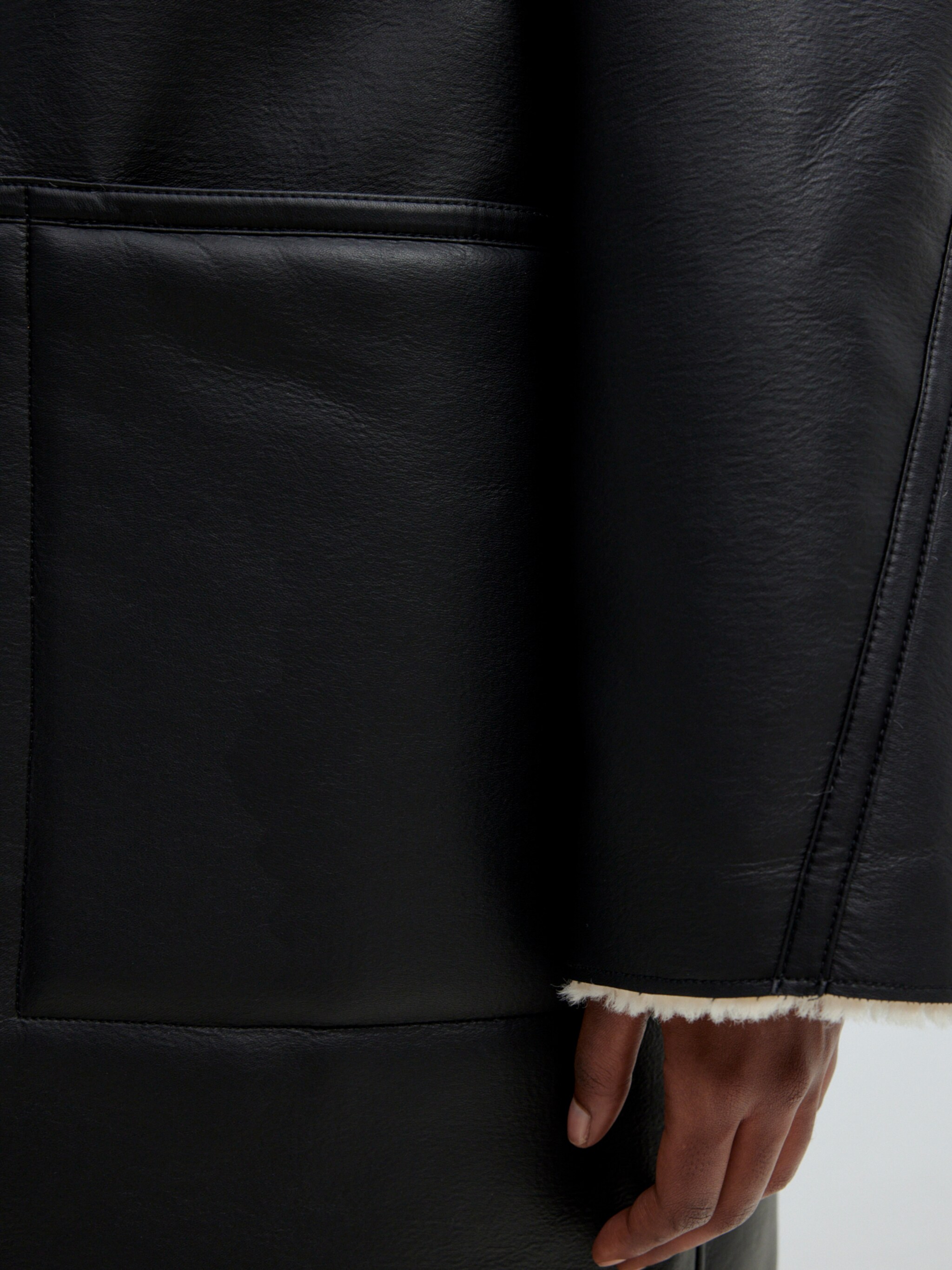 EDITED Producten Tussenmantel 'Chelsea' Zwart