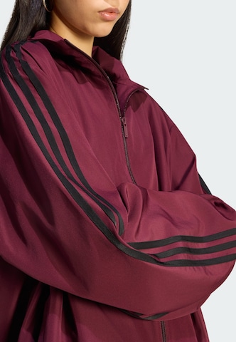 ADIDAS ORIGINALS Overgangsjakke 'Firebird Adilenium' i rød
